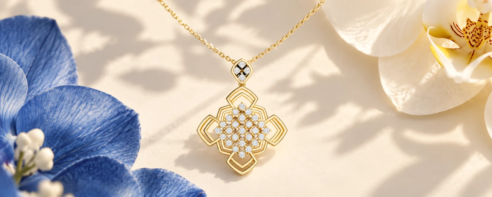 Lotus Atelier Trace gold pendant, No.08938, with geometric petals among ivory and blue orchids.